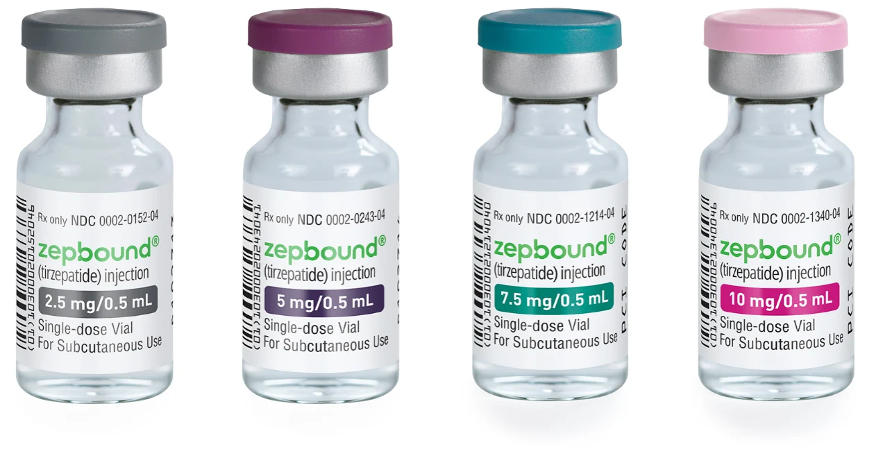 Four vials of Zepbound (tirzepatide) injection, showing different dosages (2.5mg, 5mg, 7.5mg, 10mg).